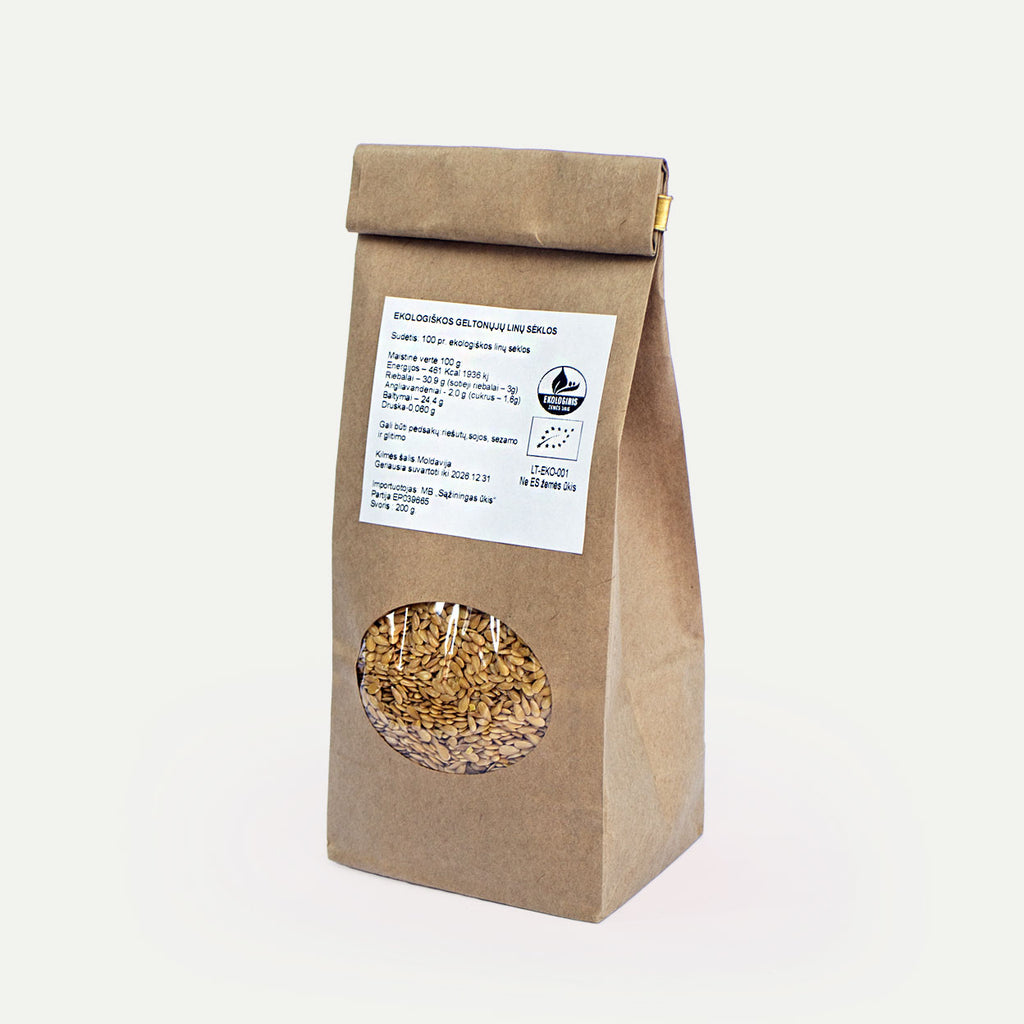 Ekologiškos geltonųjų linų sėklos pakuotėje su langeliu